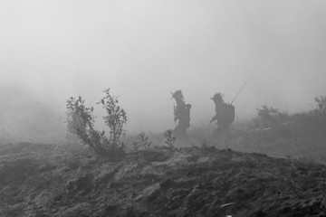 Two soldiers on smokescreen background