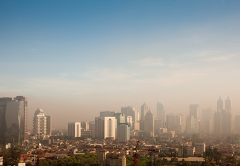 Fototapeta na wymiar Smog nad miastem