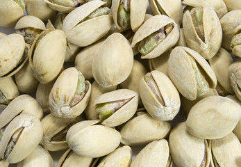 Pistachio nuts isolated on white background