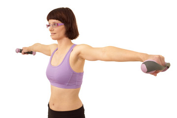 Young woman doing exercises with dumbbell