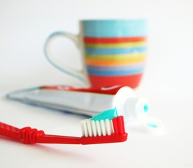 Toothbrush and paste with a mug