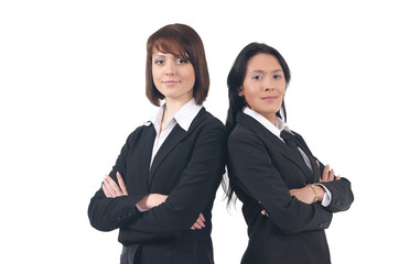 Two young business women isolated on a white backgorund