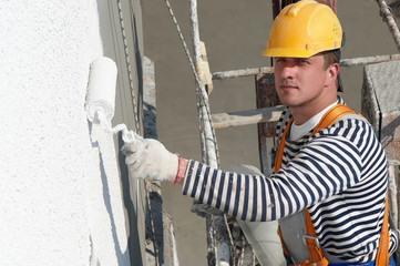 builder facade painter at work