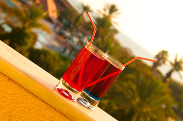 Cocktails on a hotel balcony.