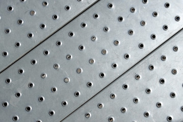 Metal plate floor close up.