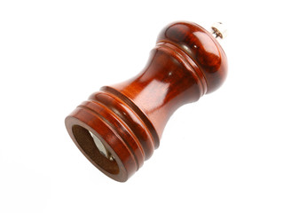 Brown wooden pepper mill isolated on white