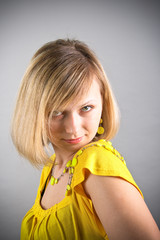 Fototapeta premium portrait of girl in yellow