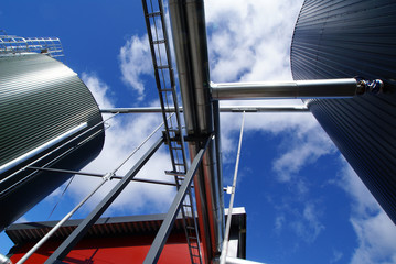Industrial zone, Steel pipe-lines on blue sky