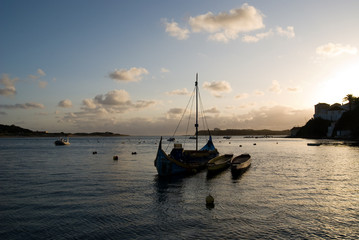 Boat at rest on a placid river