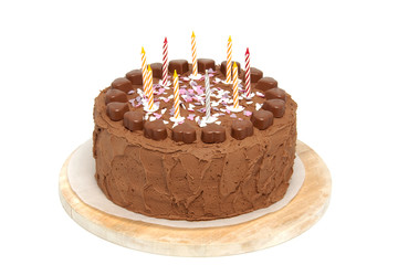 Chocolate birthday cake over white background