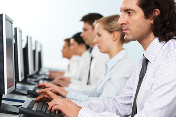Obraz premium Workers in line