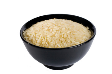 Black bowl full of rice (isolated on white)