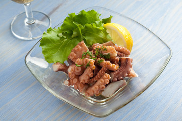 octopus and salad on dish