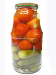 jar of preserved tomatoes and cucumbers