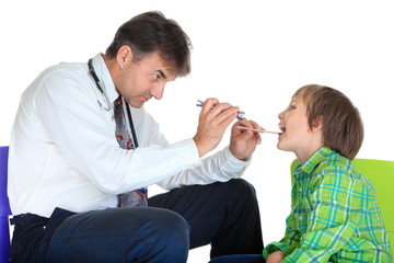 Pediatrician examining boy