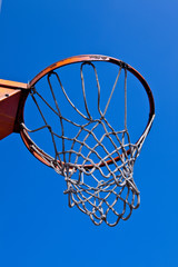 Basketball hoop isolated on blue sky