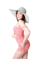 girl in a pink dress and a hat