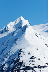 Fototapeta na wymiar Snowy mountain peaks