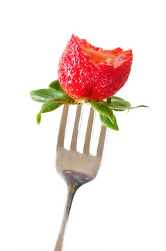 Strawberry On Fork With Bite Taken