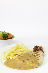 Schweinesteak mit Pfeffersoße