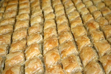 Rhombic baklava on a baking tray