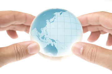 HANDS HOLD THE GLOBE