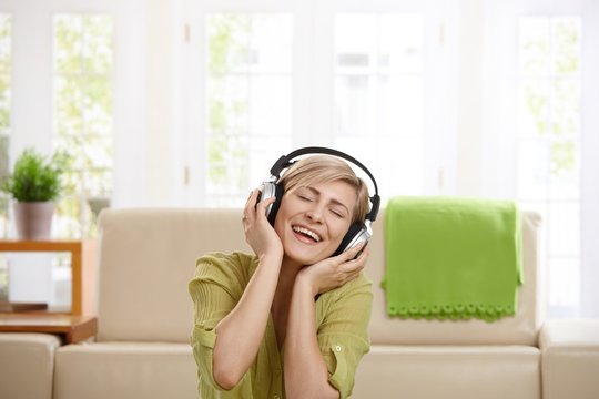 Happy woman with headset