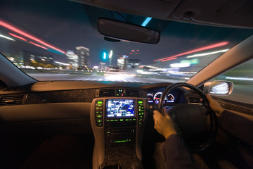 The car moves at great speed at the night.