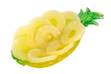 Pineapple rings on a platter forms pineapple on a white