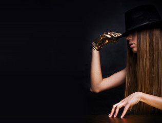 mysterious woman wearing hat