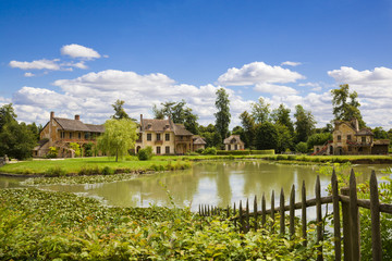 The Hamlet houses behind a lake of Versailles Chateau