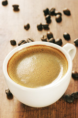 Cup of coffee and beans