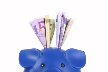 Prying piggi bank with euro