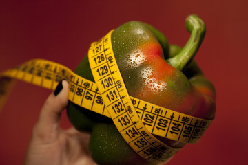 woman hand with bell pepper