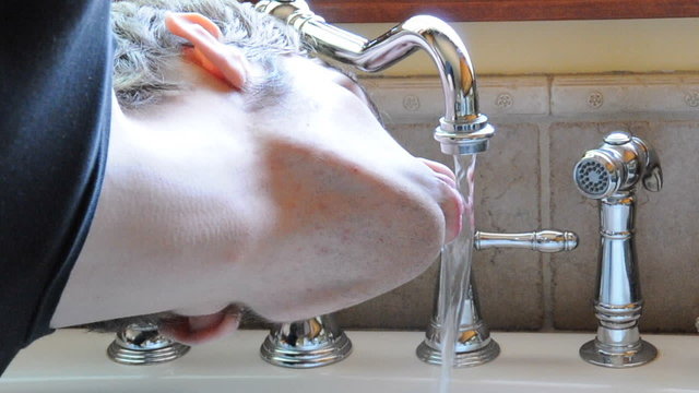 Drinking From Tap Sink