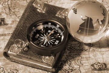 Compass on the old map