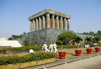 Side view with three guards in front of Ho Chi Minh mausoleum