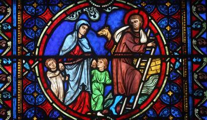 Fototapeta na wymiar Stained glass window in Cathedral Notre Dame de Paris