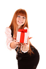 Smiling business woman with gift box  isolated on white backgrou