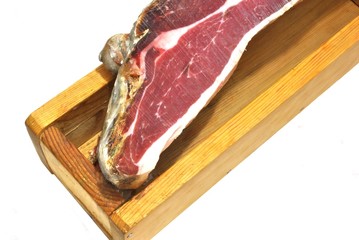 Prosciutto su morsa in legno