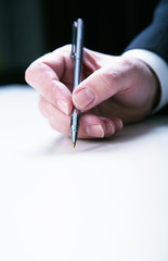 businessman's hand  with pan
