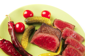 meat and vegetables with peppers