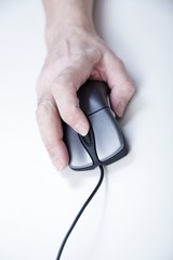 hand with computer mouse