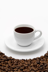 White coffee cup and grain on white background