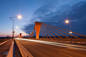 Fototapeta na wymiar Cable bridge at evening