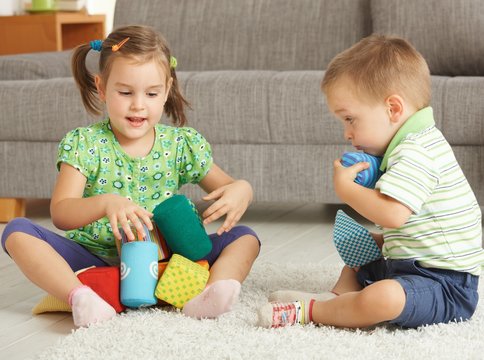 Children playing together at home