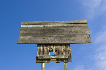 Board on a blue sky background