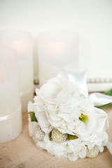 candle and white flower decoration