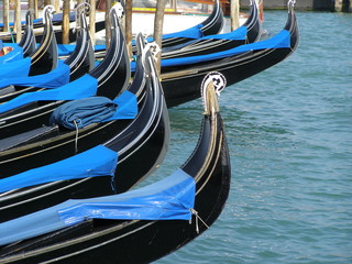 row of gondolas in Venice