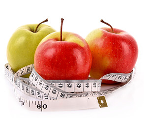 Apples and a measure tape, diet concept
